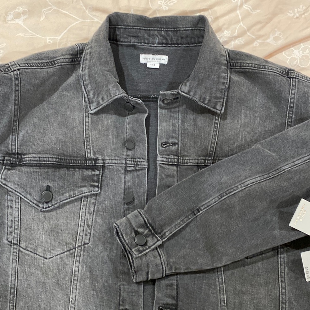 Good American Women’s black denim jacket.